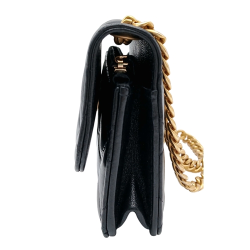 249 - A Chanel Dynasty Phone Holder Crossbody Bag. Black diamond-quilted lambskin leather exterior, gold-t... 