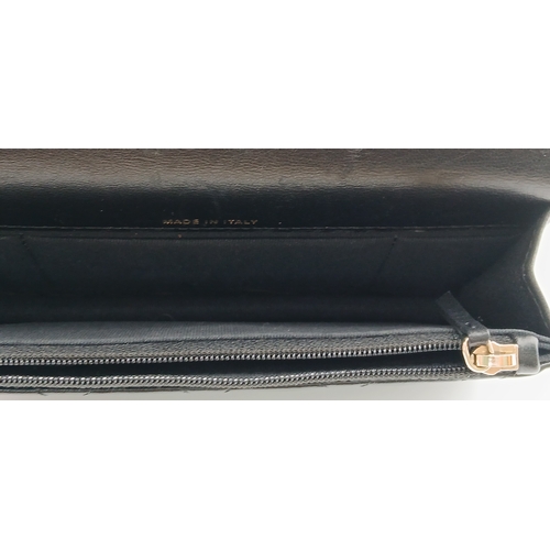 249 - A Chanel Dynasty Phone Holder Crossbody Bag. Black diamond-quilted lambskin leather exterior, gold-t... 