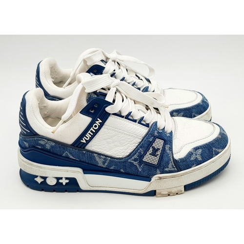 256 - A pair of Louis Vuitton embossed monogram denim sneakers. White leather and monogram denim exterior.... 