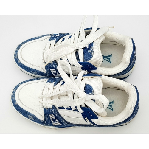 256 - A pair of Louis Vuitton embossed monogram denim sneakers. White leather and monogram denim exterior.... 