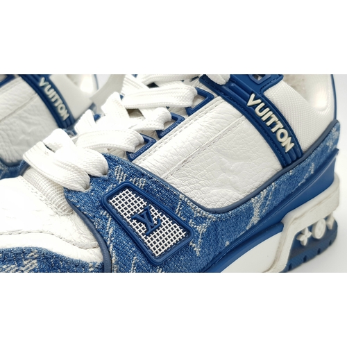 256 - A pair of Louis Vuitton embossed monogram denim sneakers. White leather and monogram denim exterior.... 