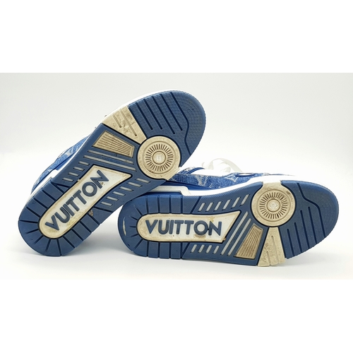 256 - A pair of Louis Vuitton embossed monogram denim sneakers. White leather and monogram denim exterior.... 
