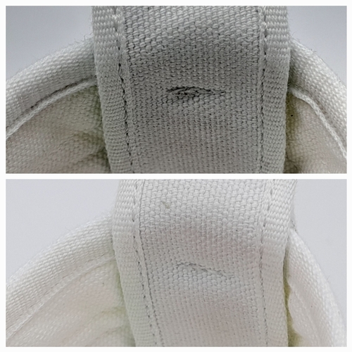 328 - A pair of Bottega Veneta Vulcan Canvas Sneakers. Optic white canvas upper with tonal stitching, rein... 