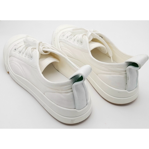 328 - A pair of Bottega Veneta Vulcan Canvas Sneakers. Optic white canvas upper with tonal stitching, rein... 
