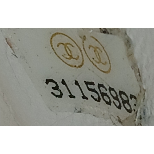 505 - A Chanel Caviar Quilted Classic Flap Bag. White diamond-quilted caviar leather with gold-toned hardw... 