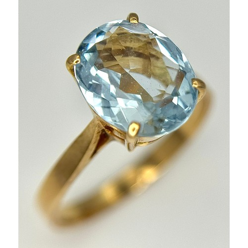 332 - An 18K Yellow Gold, Aquamarine Ring and Earring Set. Ring - 2ct oval cut, size L 1/2. Earrings - 2.5... 