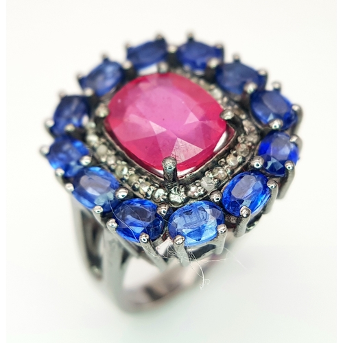 127 - A 2ct Ruby Ring with a 3ctw Kyanite Gemstone and 0.2ctw Diamond Surround. Size O. CD-1879.