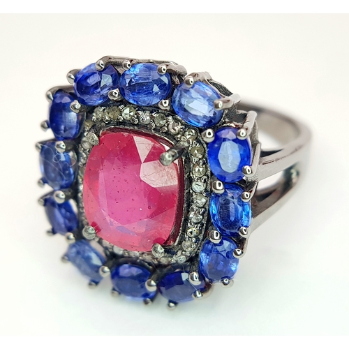 127 - A 2ct Ruby Ring with a 3ctw Kyanite Gemstone and 0.2ctw Diamond Surround. Size O. CD-1879.