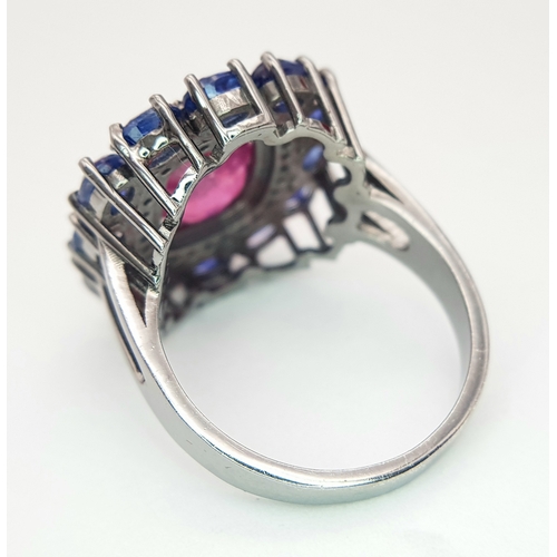 127 - A 2ct Ruby Ring with a 3ctw Kyanite Gemstone and 0.2ctw Diamond Surround. Size O. CD-1879.