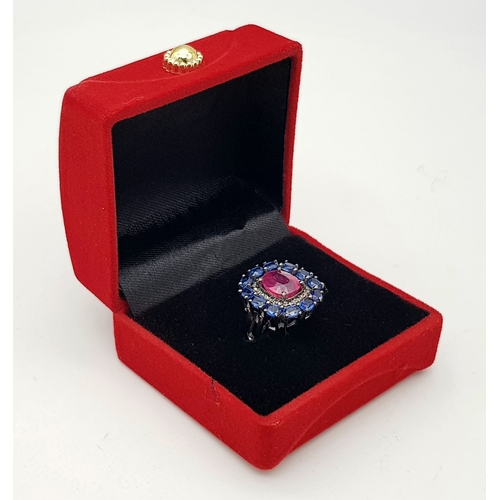 127 - A 2ct Ruby Ring with a 3ctw Kyanite Gemstone and 0.2ctw Diamond Surround. Size O. CD-1879.