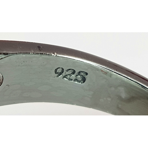 127 - A 2ct Ruby Ring with a 3ctw Kyanite Gemstone and 0.2ctw Diamond Surround. Size O. CD-1879.