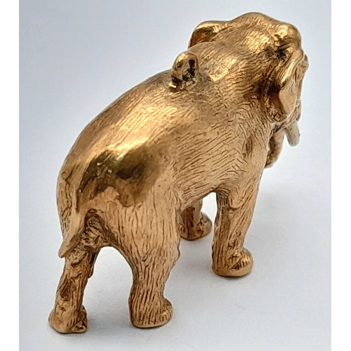146 - A Beautiful 9K Yellow Gold Elephant Pendant/Charm. 3cm. 12.1g.
