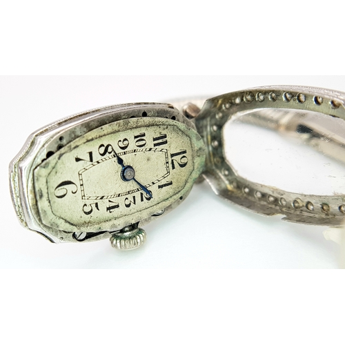 176 - A Vintage, Possibly Art Deco 9K White Gold and Diamond Ladies watch. 9k gold bracelet and elongated ... 