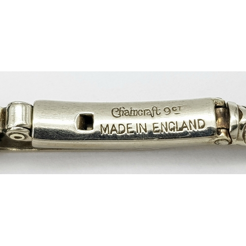 176 - A Vintage, Possibly Art Deco 9K White Gold and Diamond Ladies watch. 9k gold bracelet and elongated ... 