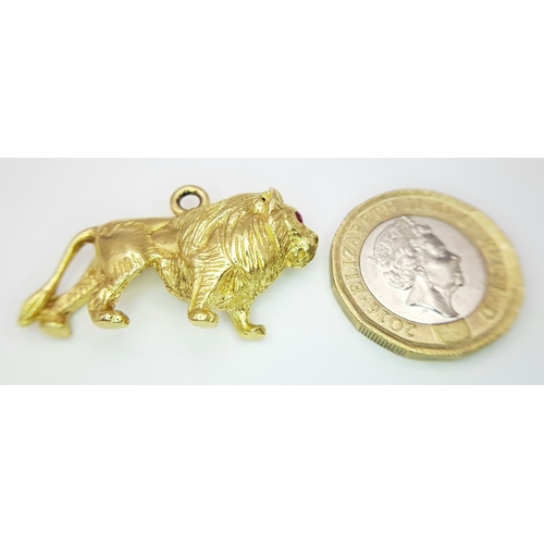 148 - A Glorious 18K Yellow Solid Gold Lion with Ruby Eyes Pendant/charm. Wonderful detail and heavy weigh... 