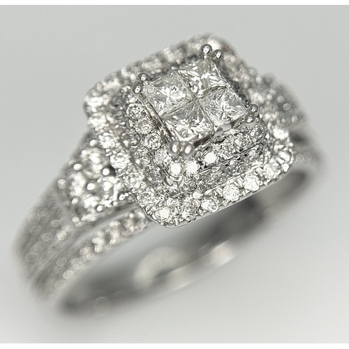 166 - A 14K WHITE GOLD DIAMOND TRIPLE HALO RING WITH DIAMOND SET SHOULDERS. MARKED BELLAGIO INSIDE. 0.90CT... 