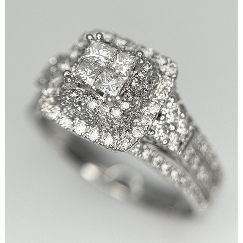 166 - A 14K WHITE GOLD DIAMOND TRIPLE HALO RING WITH DIAMOND SET SHOULDERS. MARKED BELLAGIO INSIDE. 0.90CT... 