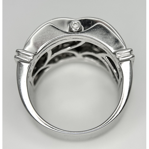 138 - A 14K WHITE GOLD FANCY DIAMOND SET RING. 1.20CTW. 15.9G. SIZE Q. JR 3008.