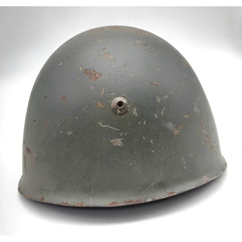 125 - WW2 Italian Bersaglieri light infantry M33 Helmet with liner and chinstrap.