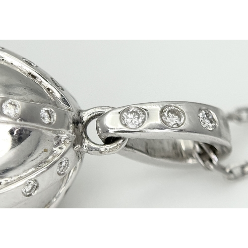 165 - A Quartz Wrapped 18K Gold and Diamond Pendant on an 18K White Gold Disappearing Necklace. 6cm and 40... 