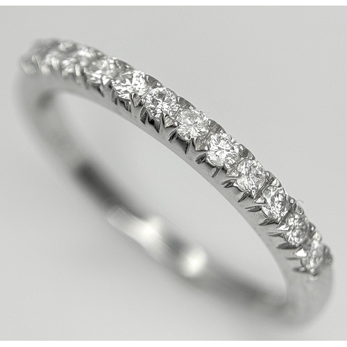 179 - A 9K White Gold Diamond Half Eternity Ring. Size O. 1.9g.  Ref: STK023249