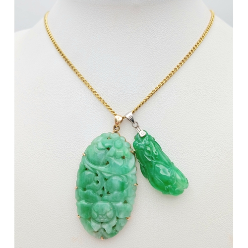 137 - Two Jade Pendants, One set in Gold on a Gilded Chain. 5cm and 3cm.  Ref: STK023083