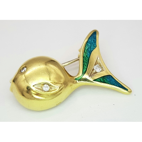 129 - An 18K Yellow Gold and Diamond Fish Brooch. Enamel accents. 22mm. 4.2g.