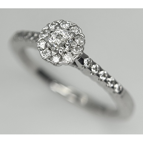68 - A 14K WHITE GOLD OLD CUT DIAMOND SOLITAIRE RING -WITH DIAMOND HALO AND DIAMOND SHOULDERS. MAIN OLD C... 