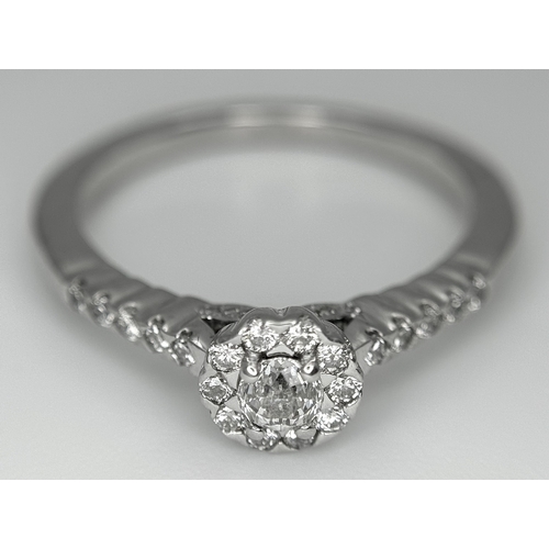 68 - A 14K WHITE GOLD OLD CUT DIAMOND SOLITAIRE RING -WITH DIAMOND HALO AND DIAMOND SHOULDERS. MAIN OLD C... 