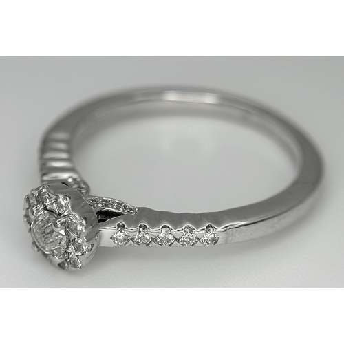 68 - A 14K WHITE GOLD OLD CUT DIAMOND SOLITAIRE RING -WITH DIAMOND HALO AND DIAMOND SHOULDERS. MAIN OLD C... 