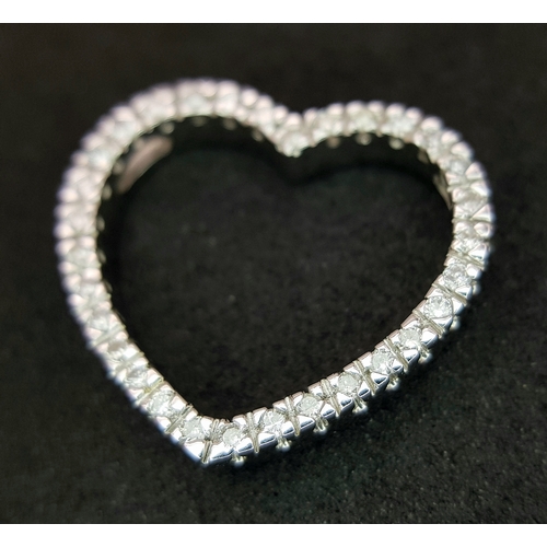 72 - AN 18K WHITE GOLD DIAMOND SET OPEN HEART PENDANT 0.25CT , 3.4G TOTAL WEIGHT, 2CM x 2CM. REF: JP 3002
