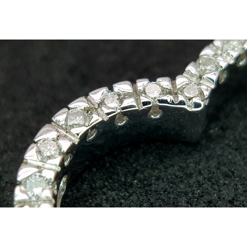 72 - AN 18K WHITE GOLD DIAMOND SET OPEN HEART PENDANT 0.25CT , 3.4G TOTAL WEIGHT, 2CM x 2CM. REF: JP 3002