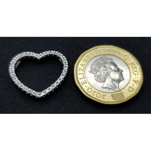72 - AN 18K WHITE GOLD DIAMOND SET OPEN HEART PENDANT 0.25CT , 3.4G TOTAL WEIGHT, 2CM x 2CM. REF: JP 3002