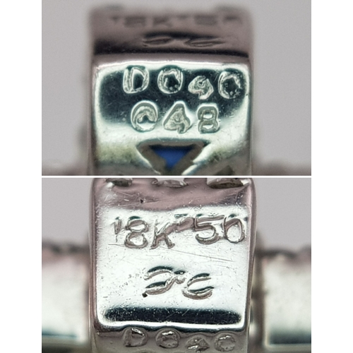 79 - AN 18K WHITE GOLD DIAMOND & SAPPHIRE SET CROSS PENDANT. APPROX 18MM X 13MM. 2.6G TOTAL WEIGHT. REF: ... 