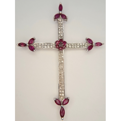 82 - AN 18K WHITE GOLD DIAMOND AND RUBY SET CROSS PENDANT. 4.1G. 6CM. SC-4084.