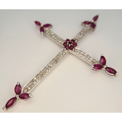 82 - AN 18K WHITE GOLD DIAMOND AND RUBY SET CROSS PENDANT. 4.1G. 6CM. SC-4084.