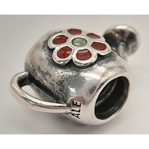 A PANDORA STERLING SILVER WATERING CAN RETIRED CHARM. APPROX 10MM X ...