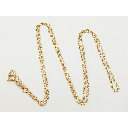 105 - Beautiful 9 CARAT GOLD FINE FIGARO CHAIN LINK NECKLACE. 1.55 grams. 50 cm.