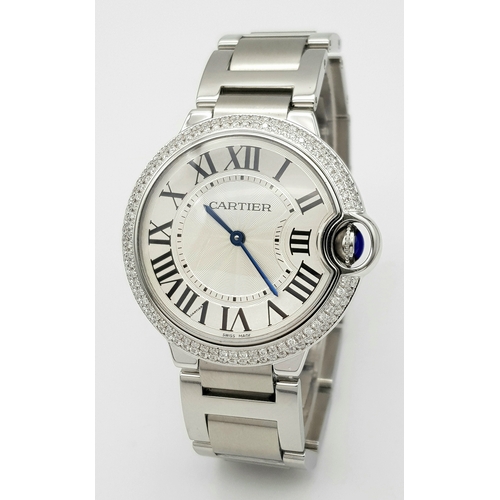 A Cartier Ballon Bleu Diamond Automatic Unisex Watch. Stainless steel bracelet and case - 37mm. Two row diamond surround bezel. White hypnotic dial with Roman numerals. Sapphire cabochon crown. In good condition and working order.