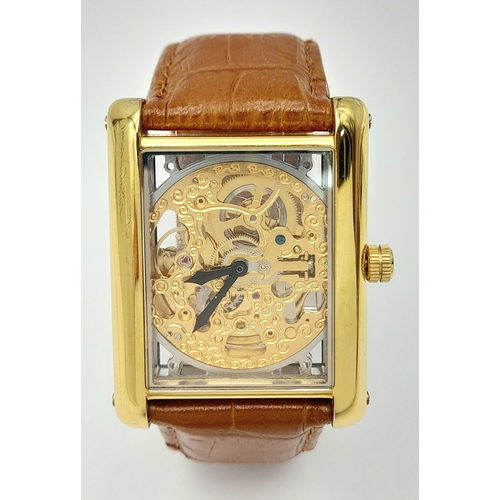 77 - Genuine Gold Plated ‘YVES CAMANI’  AUTOMATIC SKELETON WRISTWATCH. Large square face with Full Skelet... 