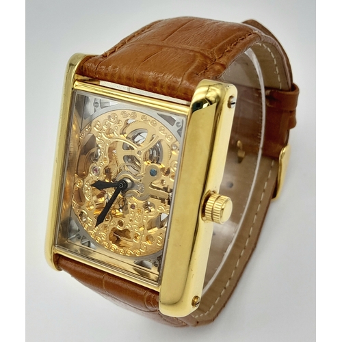 77 - Genuine Gold Plated ‘YVES CAMANI’  AUTOMATIC SKELETON WRISTWATCH. Large square face with Full Skelet... 