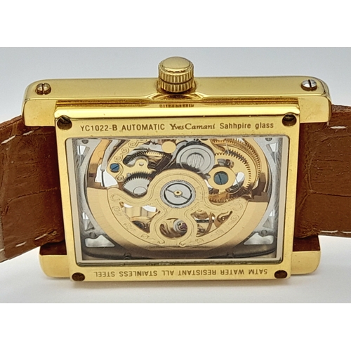 77 - Genuine Gold Plated ‘YVES CAMANI’  AUTOMATIC SKELETON WRISTWATCH. Large square face with Full Skelet... 