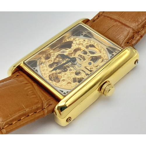 77 - Genuine Gold Plated ‘YVES CAMANI’  AUTOMATIC SKELETON WRISTWATCH. Large square face with Full Skelet... 