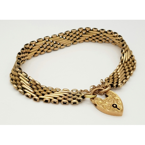101 - A Lovely Vintage 9K Gold Intricate Link Patterned Bracelet with Heart Clasp. 18cm. 14.8g.