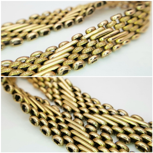 101 - A Lovely Vintage 9K Gold Intricate Link Patterned Bracelet with Heart Clasp. 18cm. 14.8g.