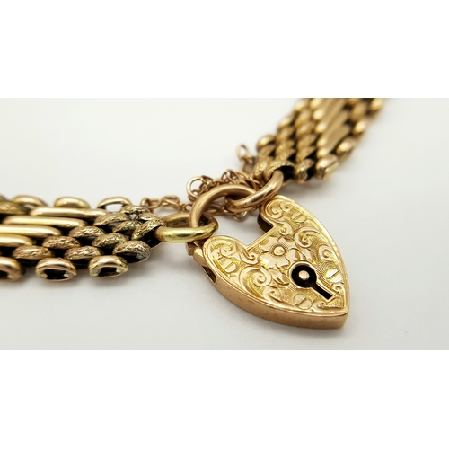 101 - A Lovely Vintage 9K Gold Intricate Link Patterned Bracelet with Heart Clasp. 18cm. 14.8g.