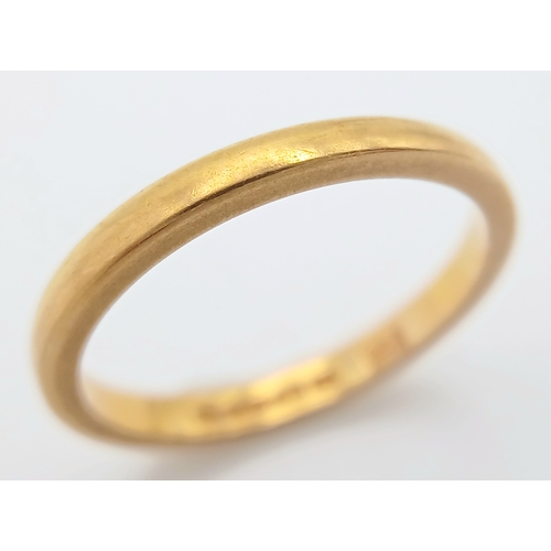 23 - A 22K GOLD BAND RING  ,    2.7gms    size K/L