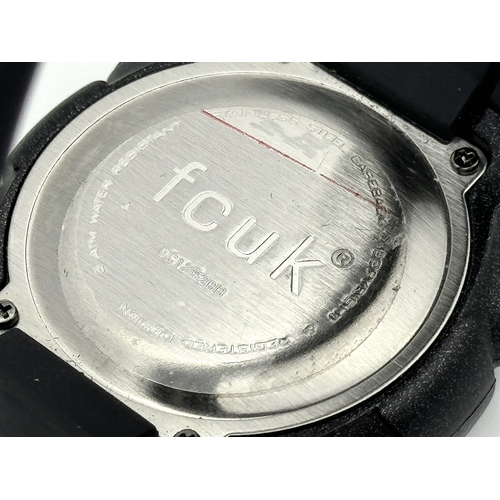 80 - A FCUK DIGITAL WATCH ON BLACK RUBBER STRAP IN FULL WORKING ORDER. S/A 1267.