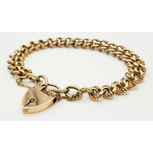 67 - An Antique 1907, 9K Rose Gold Fancy Link Bracelet with Heart Clasp. 20cm. 17.48g. R-6370921.