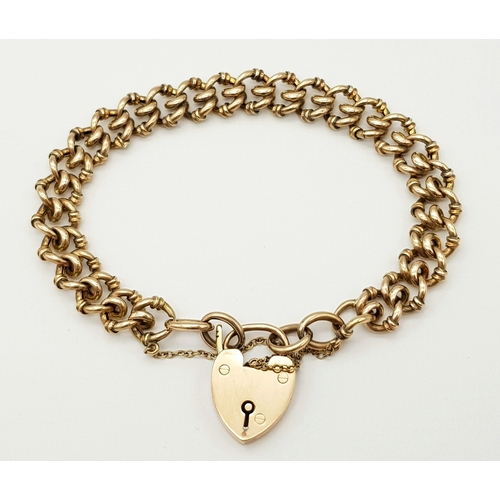 67 - An Antique 1907, 9K Rose Gold Fancy Link Bracelet with Heart Clasp. 20cm. 17.48g. R-6370921.